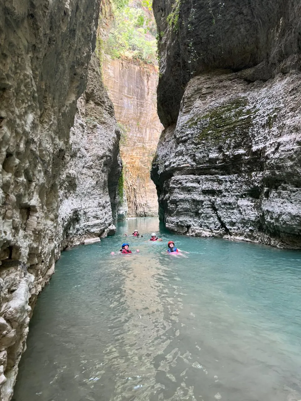 Adventurers navigating the Osum River canyon passage